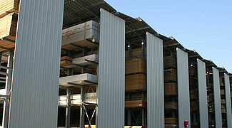 Cantilever racking system with roof and cladding wall